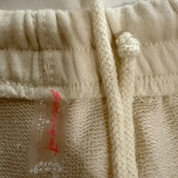 Free People Movement All Star Logo Pants in a cream color. - Picture 9 of 9